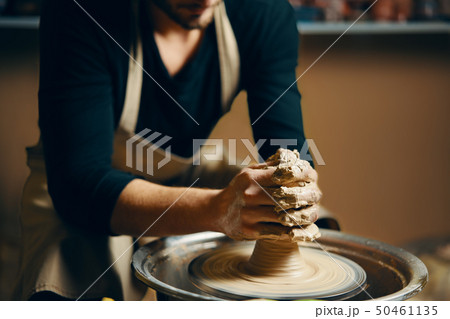 Modeling of clay on a potter's wheel in the Modeling of clay on a potter's wheel in the 50461135