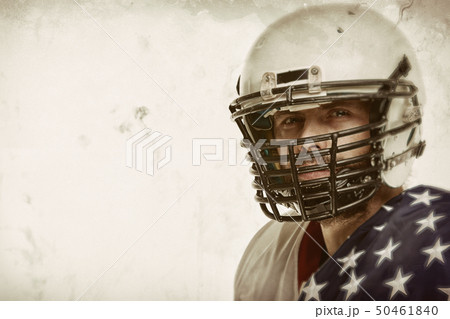 Football Player with uniform and a american flag celebrates victory, on a white background. Football Player with uniform and a american flag celebrates victory, on a white background. 50461840