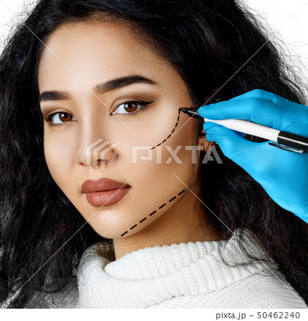 Beautiful woman face with correction lines. Beautiful woman face with correction lines. 50462240