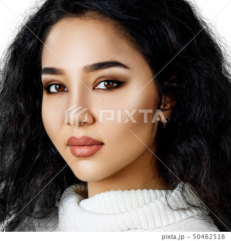 Young woman with curly black hair. 50462516