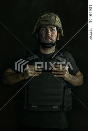 Portrait of young male soldier 50464981