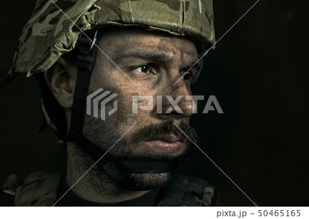 Portrait of young male soldier 50465165