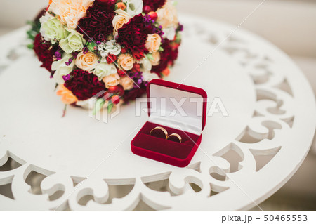 Two golden wedding rings isolated background concept Two golden wedding rings isolated background concept 50465553