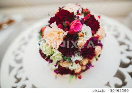 Beautiful wedding bouquet with different flowers, roses Beautiful wedding bouquet with different flowers, roses 50465590