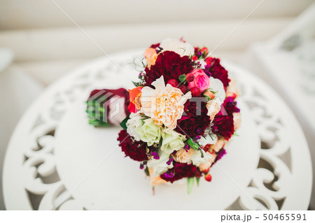 Beautiful wedding bouquet with different flowers, roses Beautiful wedding bouquet with different flowers, roses 50465591