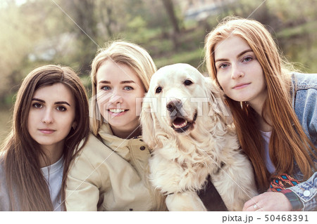 Girls wrapped in a warm blanket Girls wrapped in a warm blanket 50468391