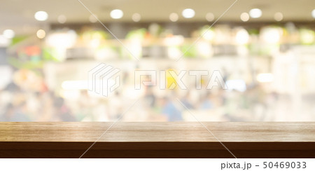 Empty wooden table top with blurred restaurant. 50469033