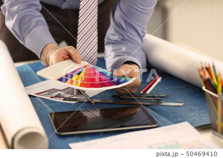 Interior Designer Working with Color Paint Swatch Interior Designer Working with Color Paint Swatch 50469410