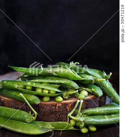 Fresh green pods from farmers market 50471219