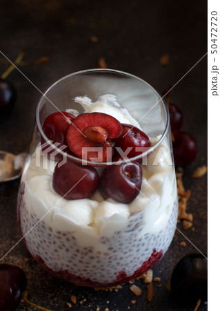 Cherry and yogurt chia pudding parfait Cherry and yogurt chia pudding parfait 50472720