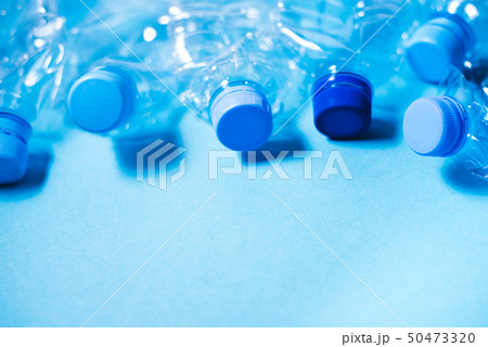 Crumpled plastic bottles of mineral water. Crumpled plastic bottles of mineral water. 50473320