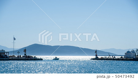 Aegina island port entrance and St Nicolaos chapel Aegina island port entrance and St Nicolaos chapel 50473492