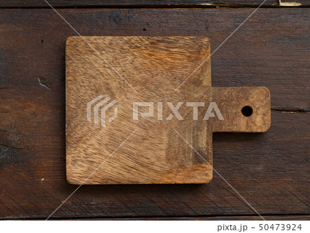 Wooden table and old cutting board Wooden table and old cutting board 50473924