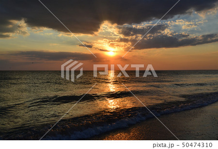 Sunset beams above Black Sea Sunset beams above Black Sea 50474310