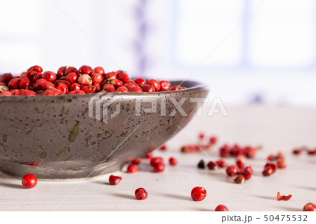 Pink peruvian pepper with blue window Pink peruvian pepper with blue window 50475532