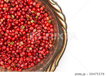 Pink peruvian pepper isolated on white 50475579