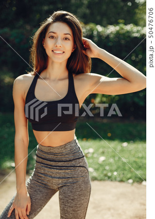 Cute girl have a rest in a summer park 50476706