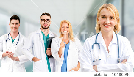 Doctor working in hospital with other doctors. Doctor working in hospital with other doctors. 50480090