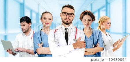 Doctor working in hospital with other doctors. 50480094