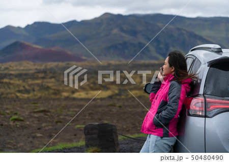Woman tourist travel by SUV car in Iceland. Woman tourist travel by SUV car in Iceland. 50480490