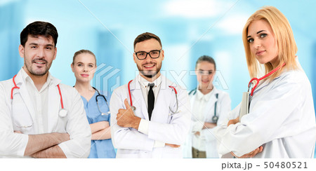 Doctor working in hospital with other doctors. 50480521