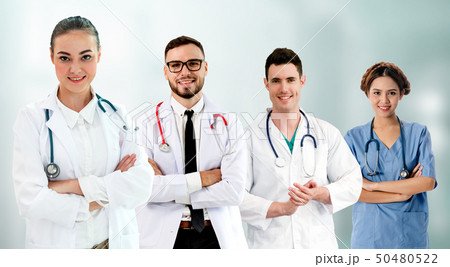 Doctor working in hospital with other doctors. Doctor working in hospital with other doctors. 50480522
