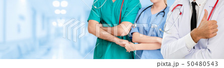 Doctor working in hospital with other doctors. 50480543