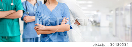 Doctor working in hospital with other doctors. Doctor working in hospital with other doctors. 50480554