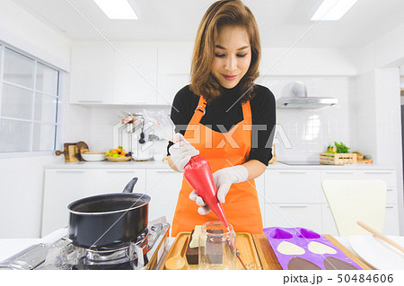Woman making chocolate 50484606