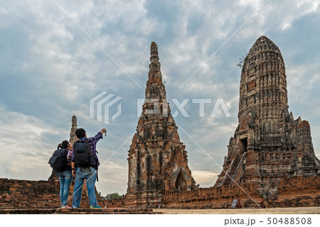 Traveler man and women with backpack walking 50488508