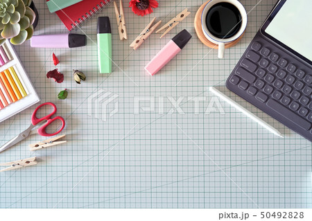 Graphic designer's workspace with a pencil tablet, 50492828