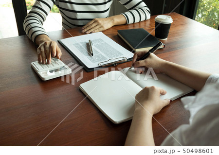 Woman talking with colleague about new startup. 50498601