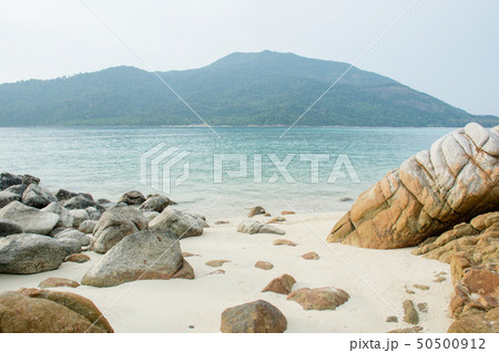 Sea tropical landscape with mountains and rocks Sea tropical landscape with mountains and rocks 50500912