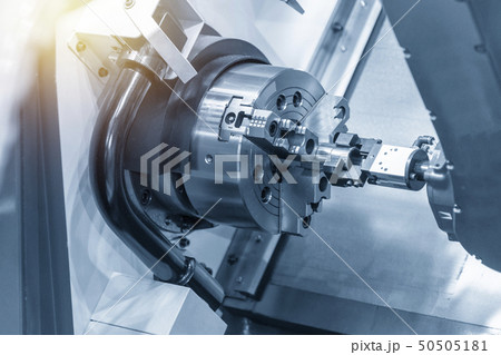 The robotic arm keep the metal shaft part . The robotic arm keep the metal shaft part . 50505181