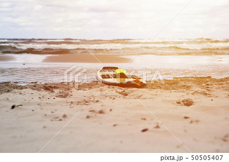 close up on kitesurfing board on the beach 50505407