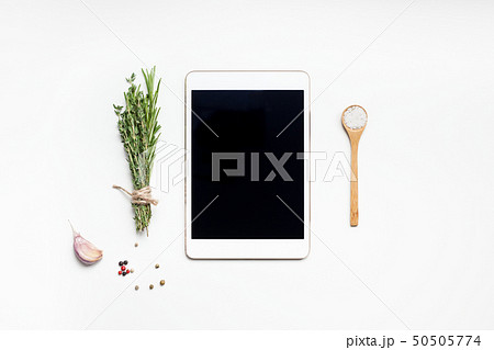 Empty tablet PC with greens herbs and spices 50505774