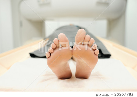 Mature Patient With Health Problems Doing MRI In Medical Center Mature Patient With Health Problems Doing MRI In Medical Center 50507792