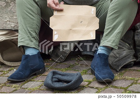 closeup of homeless woman begging  50509978