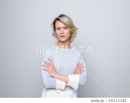 Sad blond Woman in studio. 50512185