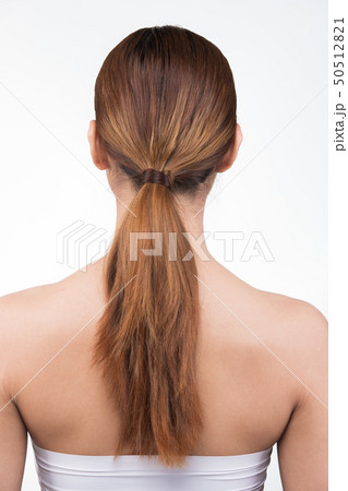 Asian Woman after applying make up hair style 50512821