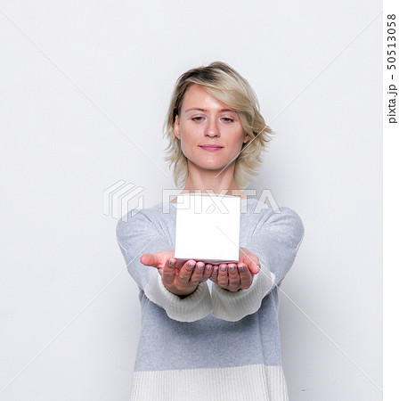 Small gift in the hands of a woman. Small gift in the hands of a woman. 50513058