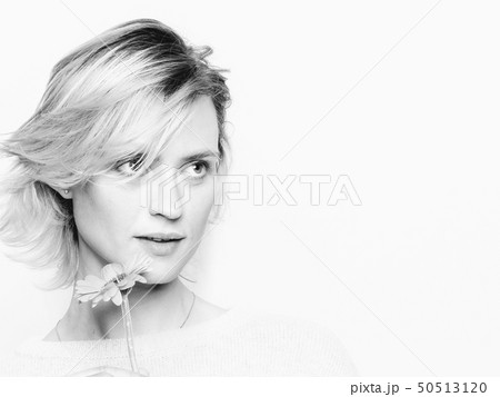 Woman with pink flower Woman with pink flower 50513120
