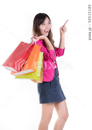 Woman in Trendy clothes with a lot of shopping bag 50515185
