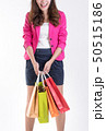 Woman in Trendy clothes with a lot of shopping bag 50515186