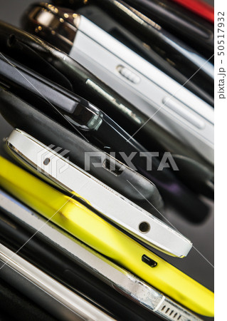 old and broken smartphones and mobile phones old and broken smartphones and mobile phones 50517932