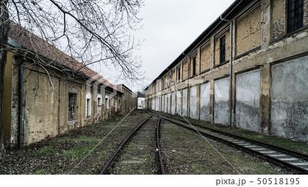 old unused railway line between two huts old unused railway line between two huts 50518195