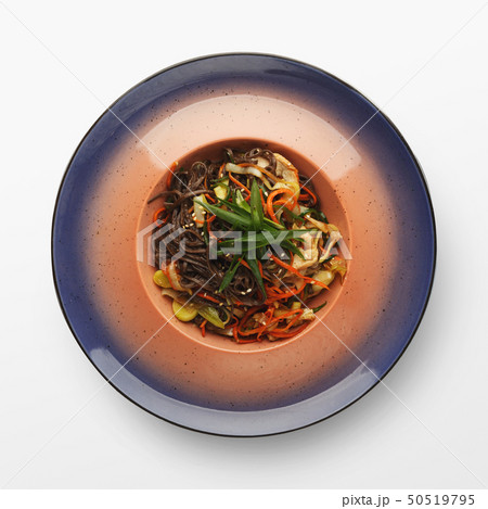 Buckwheat noodles with chicken and vegetables, isolated Buckwheat noodles with chicken and vegetables, isolated 50519795