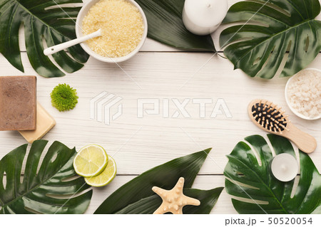 Spa background with facial mask and cream on white wood Spa background with facial mask and cream on white wood 50520054