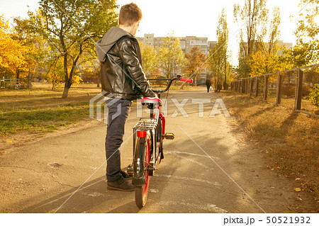 Happy boy ride the bicycle Happy boy ride the bicycle 50521932