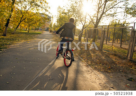 Happy boy ride the bicycle Happy boy ride the bicycle 50521938